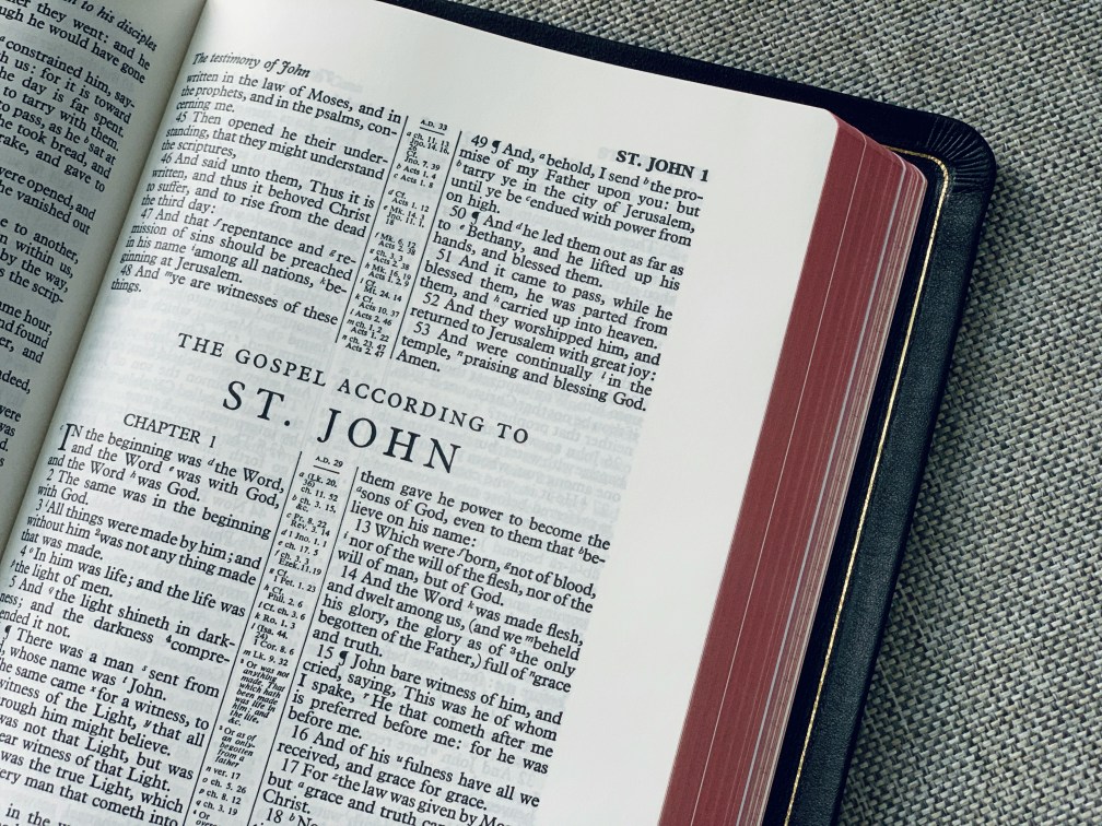 Bible opened to the beginning of the Gospel According to St. John.